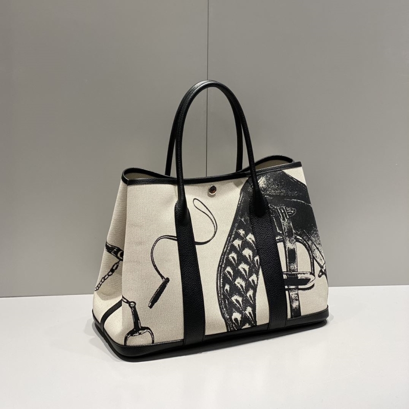H**mes shopping bags